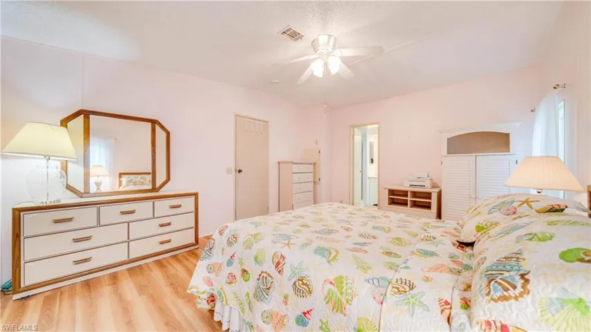 Sunken tub to the right. Updated walk-in shower to the left. And; a linen closet.