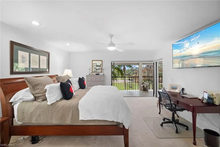 Bedroom with access to outside, ceiling fan, carpet, an office area, and recessed lighting