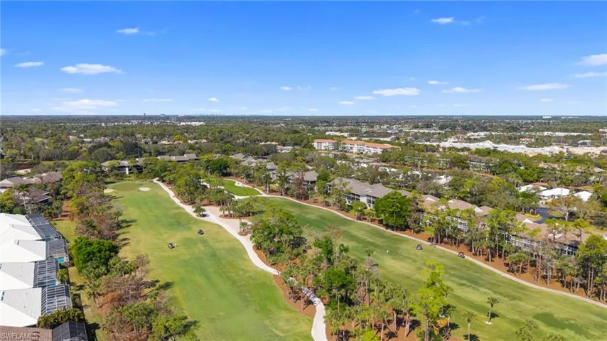 Aerial view of residential area with a golf club