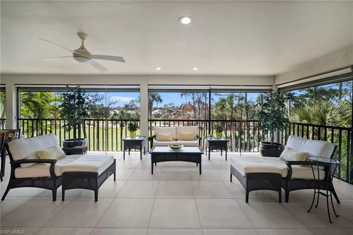 Sunroom / solarium featuring an outdoor hangout area, a ceiling fan, and healthy amount of natural light