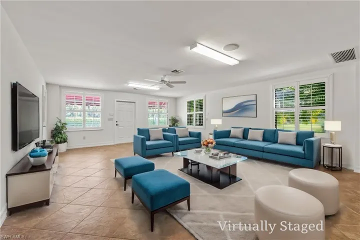 1200 sq. ft. Guest Quarters Living space with tiled  floors., Impact windows and Plantation Shutters