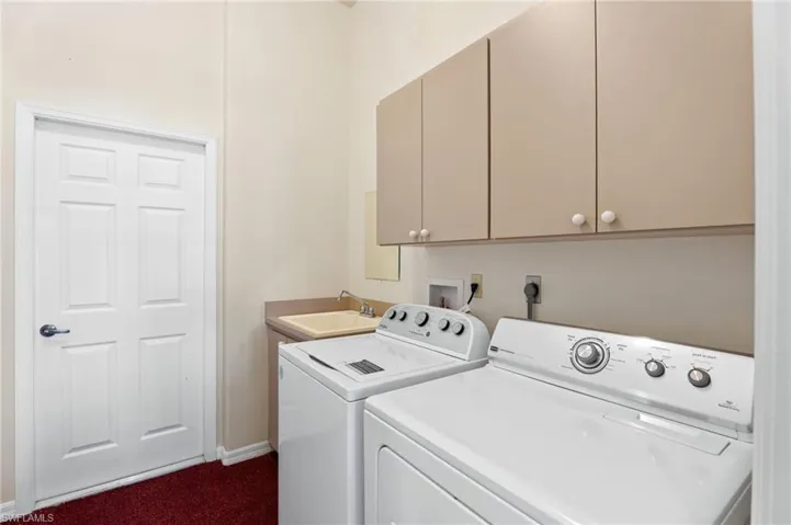 Unfurnished office featuring carpet flooring and wainscoting