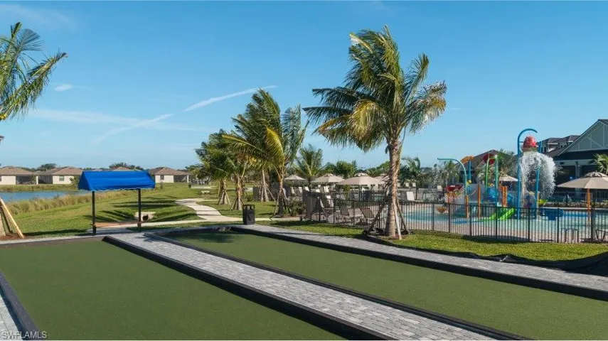 Surrounding community with a game area and fence