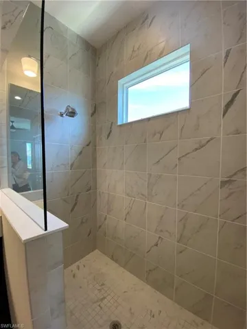 Bathroom featuring walk in shower