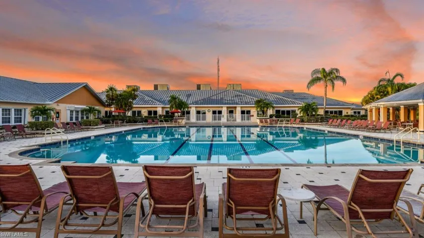 Community pool with a patio area