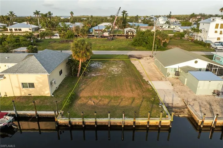 Aerial view of residential area with a large body of water