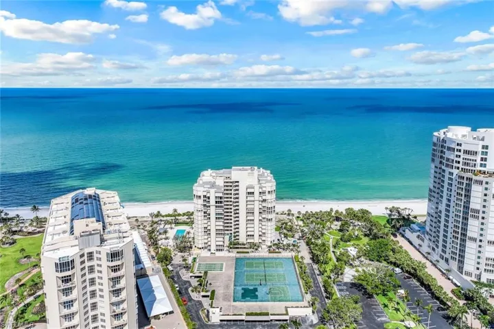 Bird's eye view of extended coastline and a pool