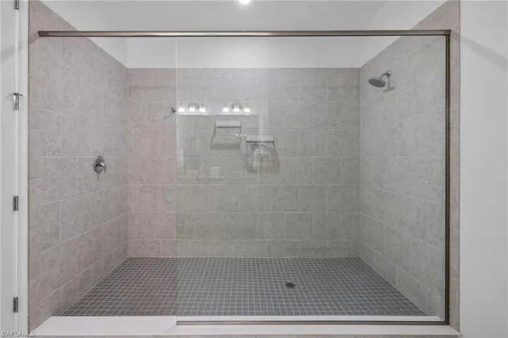 Full bathroom with a stall shower