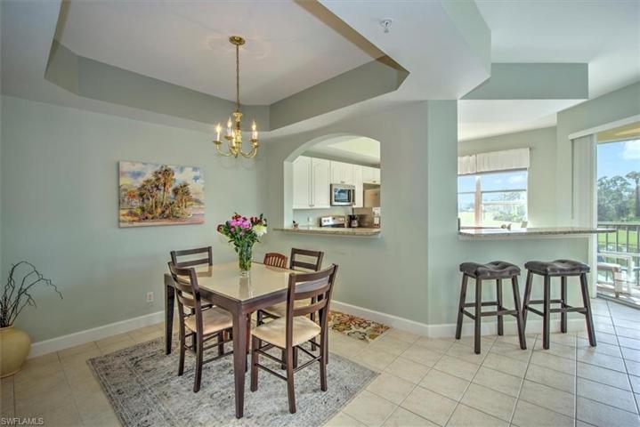 Open concept dining room accented by coffered ceiling!
