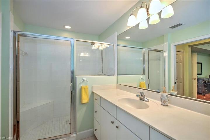 Master bathroom with tiled shower and dual sink area!