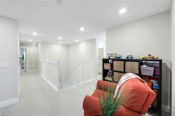 Living area with carpet flooring