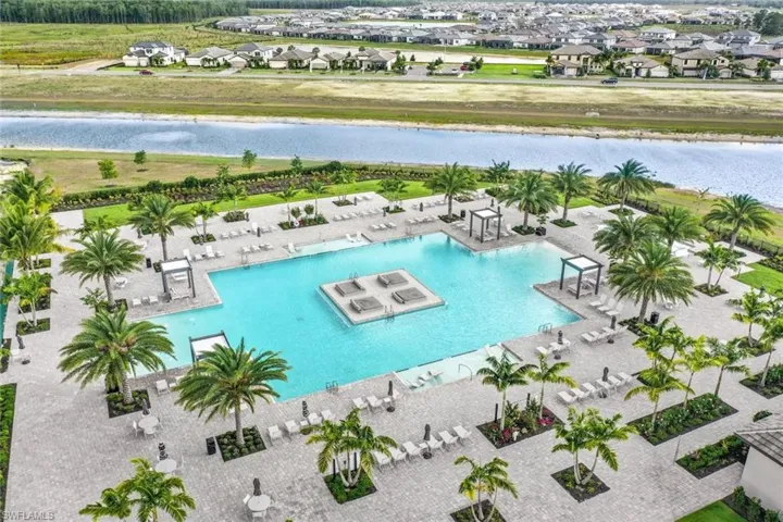 View of swimming pool with a water view