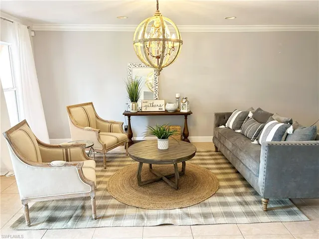 The seller is taking the chandelier to her next home