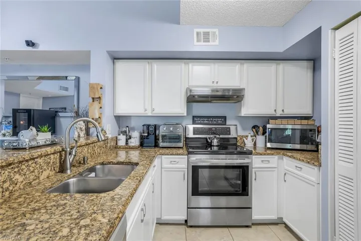 1230  Wildwood Lakes  BLVD, Naples, FL 34104