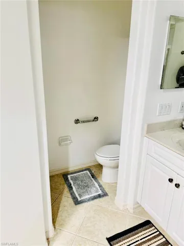 Bathroom featuring vanity and light tile patterned floors