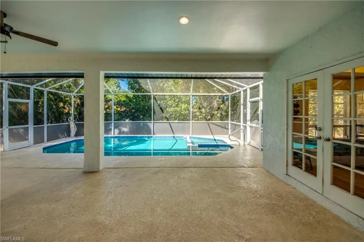 Large, under cover lanai area overlooking the pool