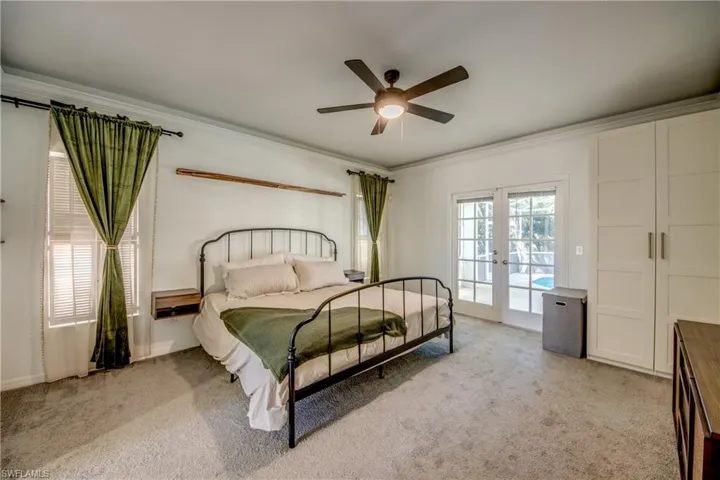 Primary Bedroom with french door exit to the lanai