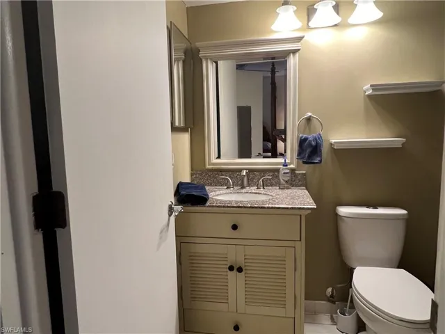 Bathroom with vanity and toilet