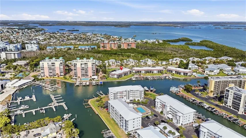 Bird's eye view of a nearby body of water and a marina