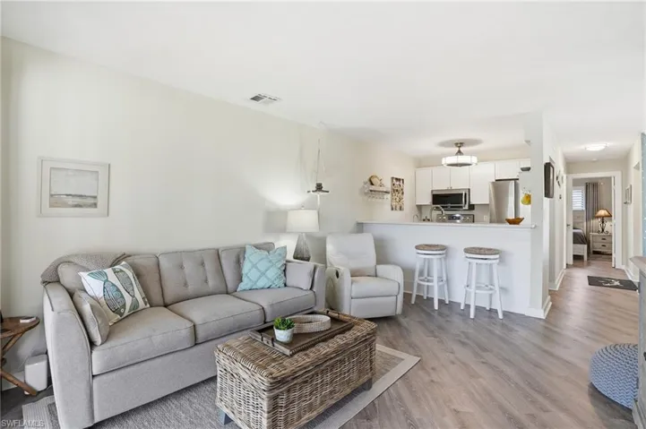 Living room featuring light wood-style flooring
