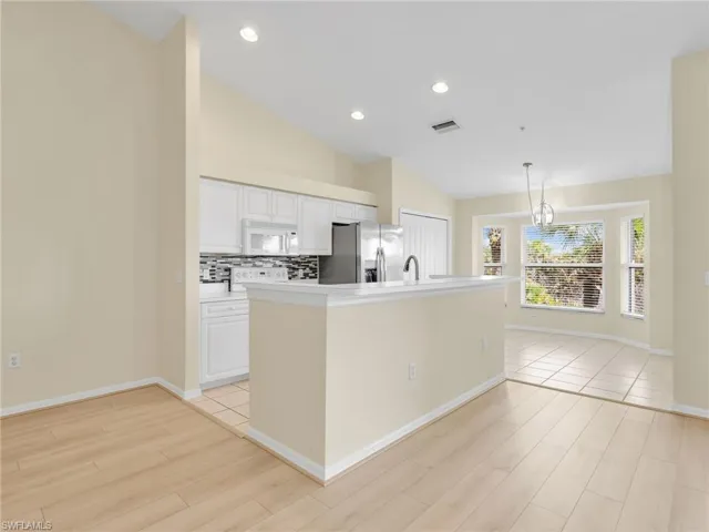 Kitchen with Island, Eat In Kitchen with Bay Window, and Dining Room