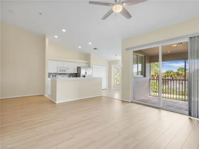 Dining Room, Kitchen with Island, Eat In Kitchen with Bay Window, Great Room, & Sliders Leading to Screened In Lanai