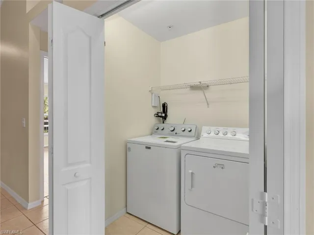 Laundry Closet with Washer & Dryer & Wire Shelving