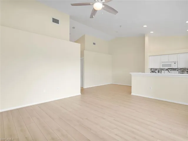 Great Room, Kitchen with Island, and Dining Room