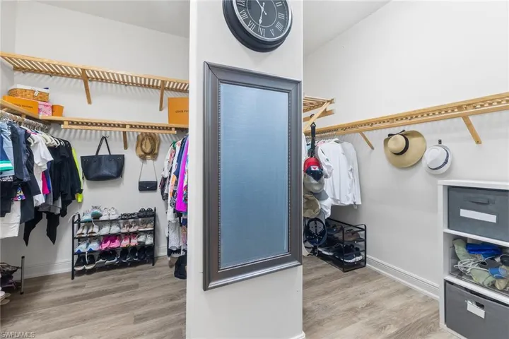 Spacious closet featuring light wood finished floors