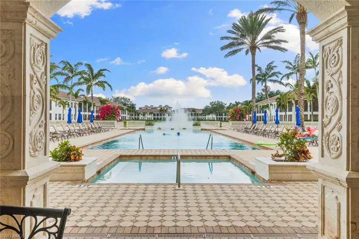 Community pool featuring a patio area
