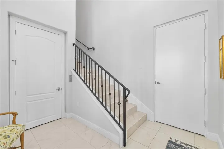 Entryway featuring stairway
