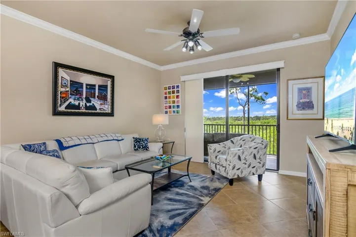 Living Room with upgraded light/fan fixture and blinds
