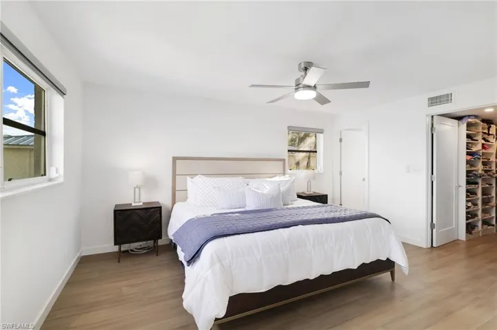 Bedroom featuring light wood-style floors and ceiling fan