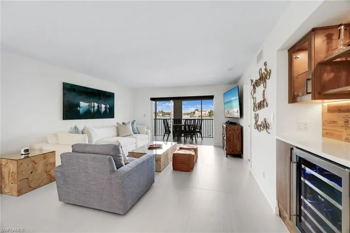 Living area featuring wine cooler