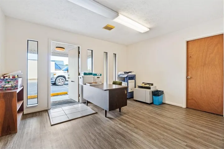 Office with a textured ceiling