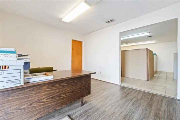 Unfurnished office with a textured ceiling