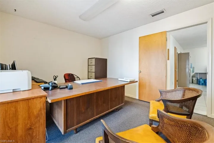 Office with a textured ceiling