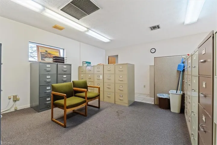 Office with a textured ceiling