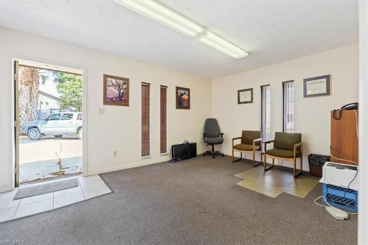 Sitting room with a textured ceiling