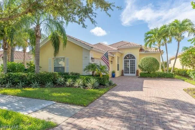 Mediterranean / spanish-style house with french doors