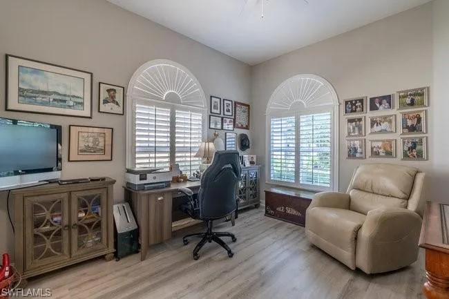 Office area featuring light hardwood / wood-style floors
