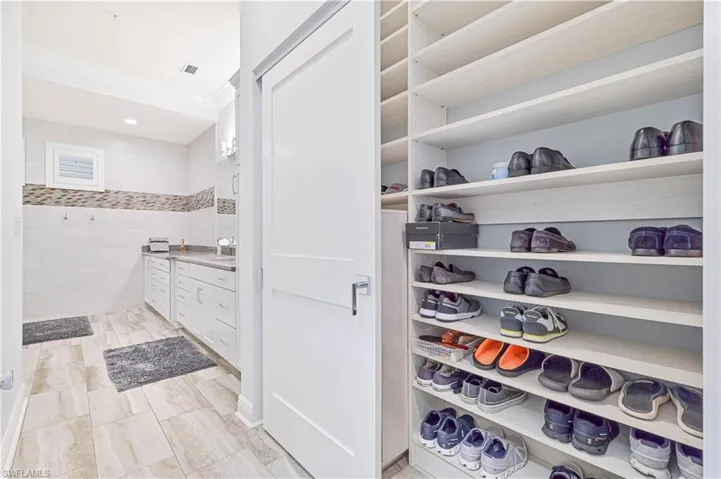 Walk in closet featuring sink