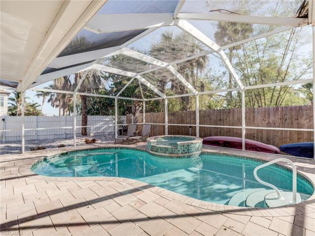 Relax is the spacious pool with a beverage!