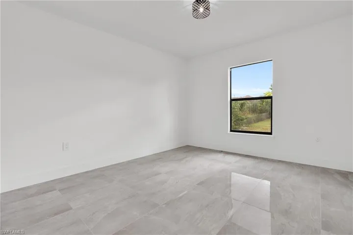 Empty room with baseboards
