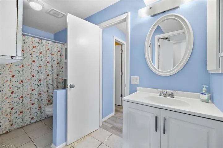 Bathroom with entrance to Bedroom 1 and hallway