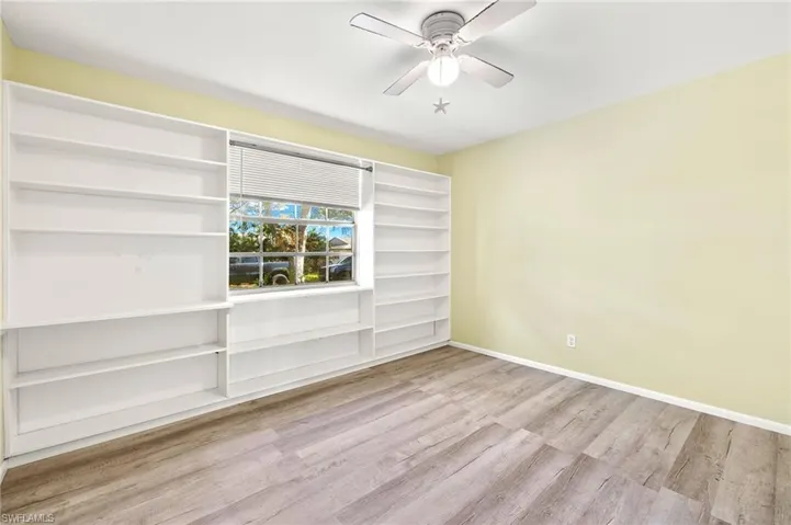 Bedroom 2 with built in shelving