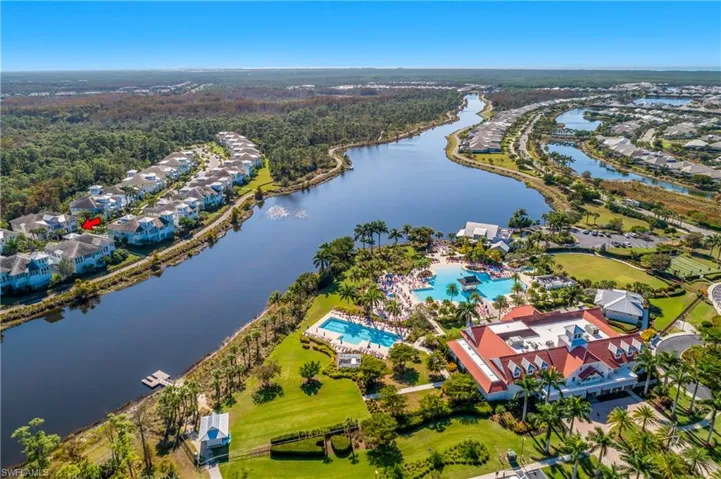 Aerial view of a large body of water and a pool area