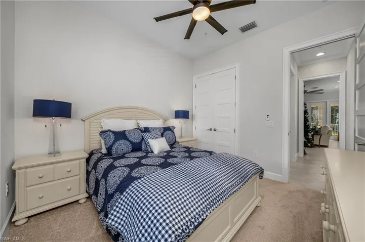 2nd Bedroom with ceiling fan, a closet, light carpet, and recessed lighting