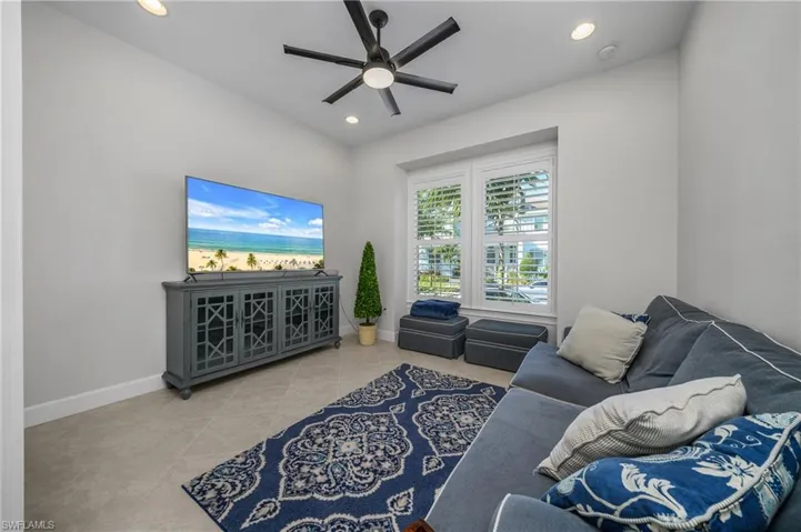 3rd Bedroom with ceiling fan, light tile patterned flooring, and recessed lighting