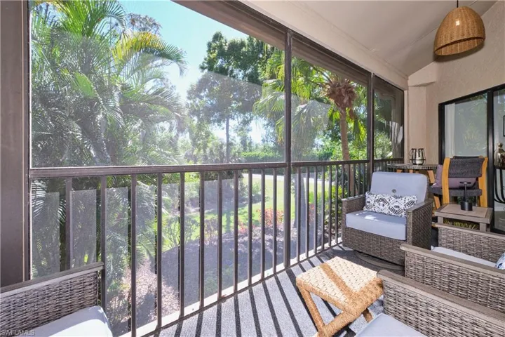Screened lanai with lovely landscape views.